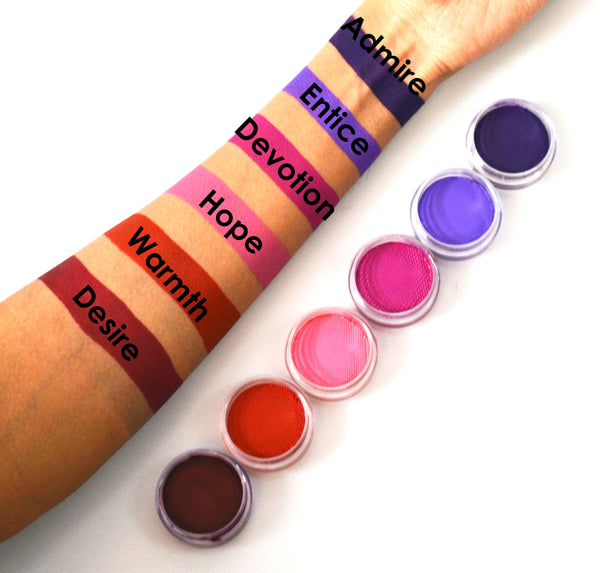 Warm matte water activated eyeliner swatches, including dark purple, purple, hot pink, pink, red and dark red.